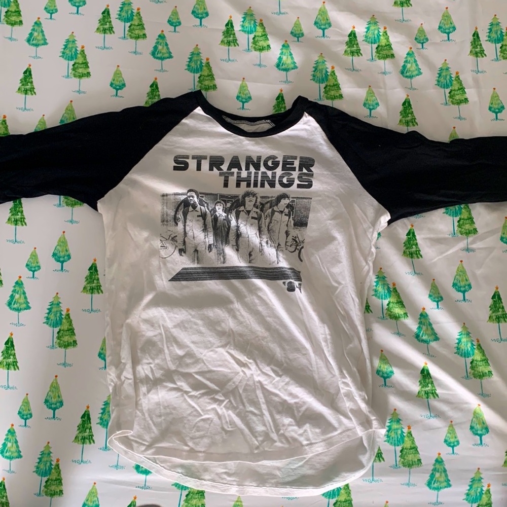 Netflix official merchandise stranger Things tee. Unisex and eggshell white.